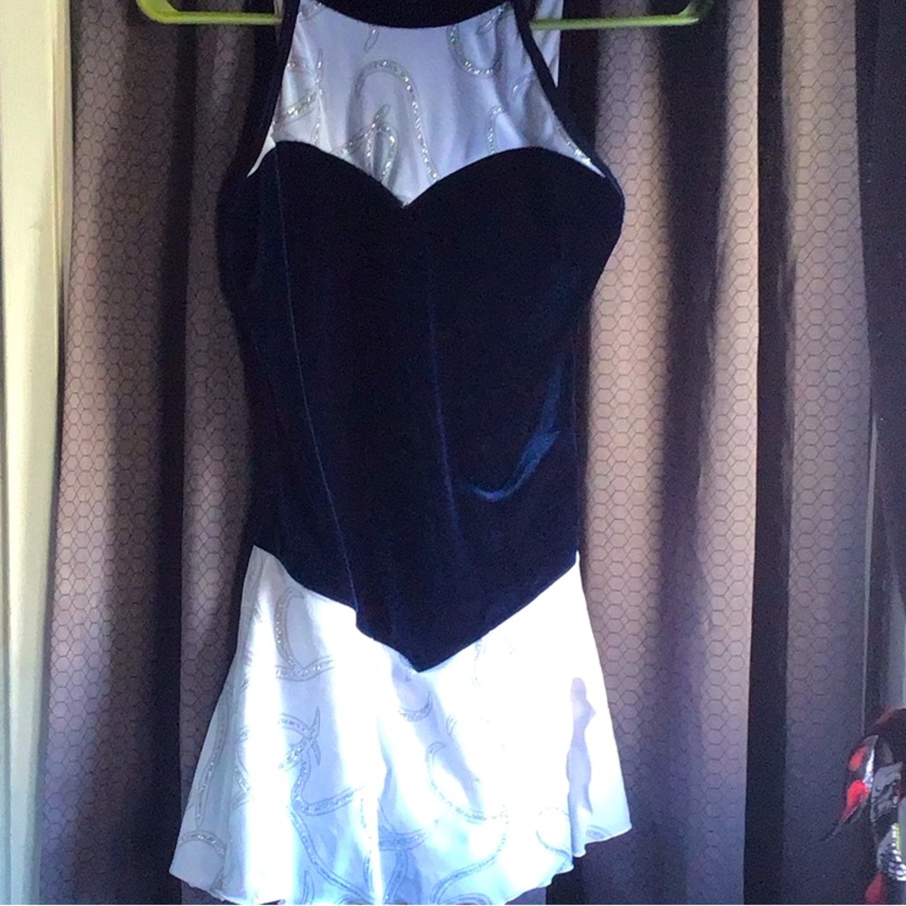 2 matching SIX O skating dresses. 1 Sm and one 1 tall $60 each $100 both